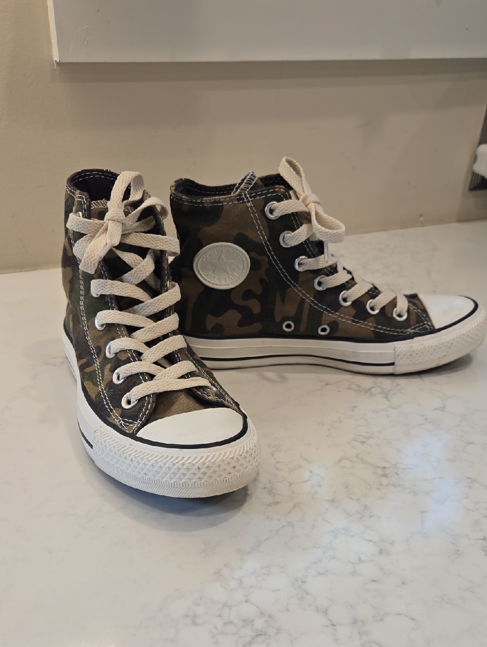 Converse Camo High Tops